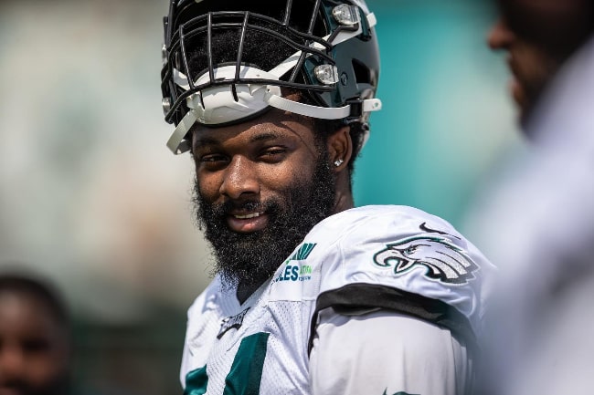 Josh Sweat wearing a helmet in the game in 2021